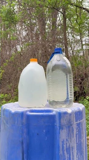 Water Jugs blown up by 357 Magnum