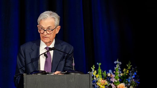 Powell Says Tariff Costs to Consumers ‘Later and Less’ Than Expected