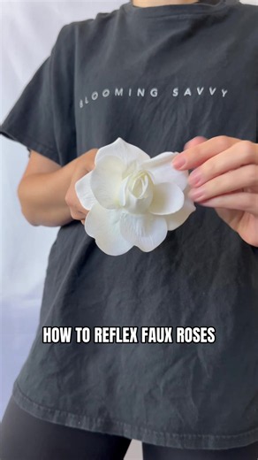 This is how to reflex roses when you’re working with artificial flowers. You don’t have to purchase expensive faux flowers that are already reflexed. You can create this style of reflexed rose by using inexpensive fabric roses and bending the petals backward. I’m using these reflexed roses in a modern, artistic bridal bouquet design. #floraldesign #fauxflowers #bridalbouquet #diyflowers #flowertutorial
