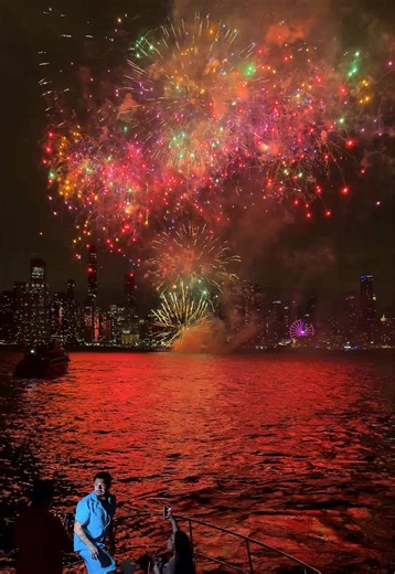 Chicago skyline and Navy Pier fireworks over the lake