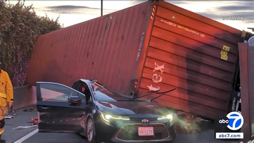 Overturned big rig crushes car in wild 91 Freeway crash