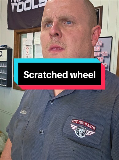 Mechanic Fixes a Scratched Wheel on a Car or Truck