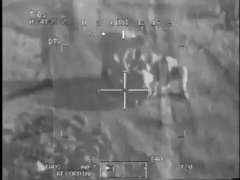 An improvised explosive device made from a 155 mm artillery shell detonated while Iraqi soldiers were attempting to defuse it.The incident was recorded by a FLIR thermal imager mounted on an AH-64D Apache helicopter.
