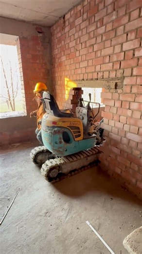 Watch This Mini Excavator Demolish Walls Indoors😱