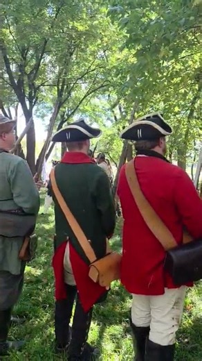 Saluting the colonials as they march past