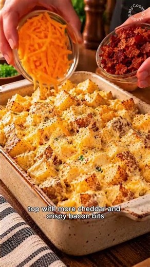Loaded Cheesy Potato CasseroleGolden potatoes baked in a creamy cheese sauce, topped with crispy.