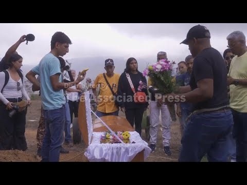 Relatives bury victim of U.S. strikes in Venezuela