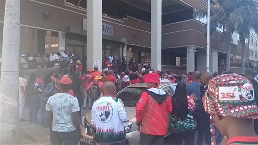 **SADTU Members Assemble Outside SARS Building in Durban to Address Tax and Worker Issues**Members and advocates associated with the South African Democratic Teachers' Union gathered in front of the South African Revenue Service offices in Durban to express their discontent.