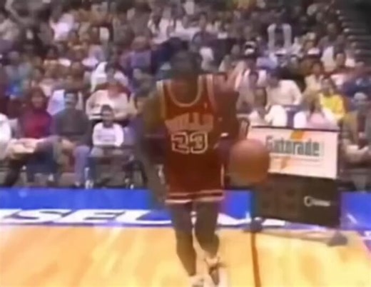 Michael Jordan dunks the ball from free throw line, 1987 NBA Dunk Contest