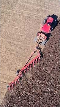 Case IH 620 quadtrac tractor with the 10 furrow plough