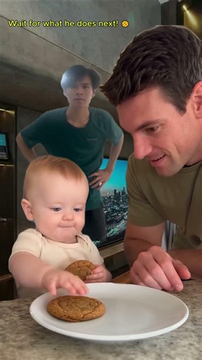 Baby passes the cookie patience test! 🍪👶