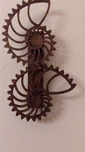 The Logarithmic Spiral Gears is an extreme example of non-circular gear sets. It's based on the famous Fibonacci spiral and evokes the cross section of a nautilus shell with internal chambers