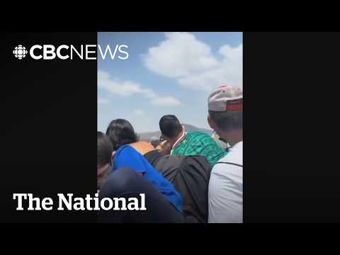 Witness video shows tourists taking cover during Mexico shooting