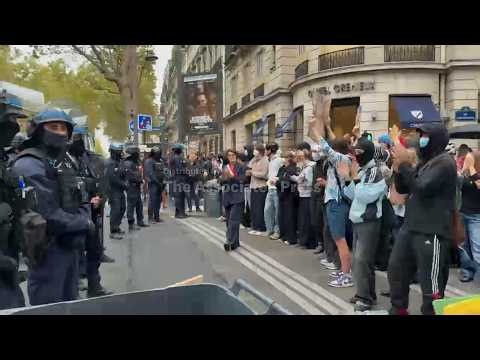 Sciences Po students join protest in Paris demanding more education funding as riot police watch on
