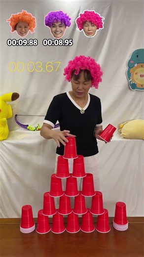 Paper cup stacking speed challenge how many seconds can you stack them?