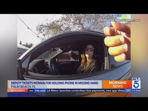 Viral bodycam shows deputy accuse woman of using missing right hand to hold phone