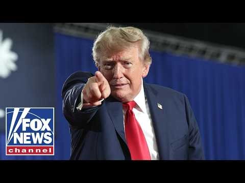 President Trump holds a midterm rally in Mobile, Ala.