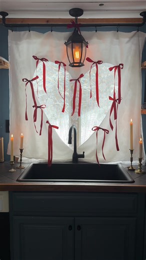 Keeping the whimsy alive with this easy thrift flip from a bedsheet into a heart curtain. My sewing machine ran out of thread (lol) and I had to pin edges of the heart for it to expand fully. With a lace curtain & some ribbons I think it was a happy accident and maybe it wasn’t meant to be sewed after all. #valentinesday #homediy #whimsicalhome #cabininthewoods