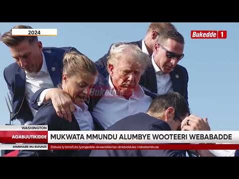 Agabuutikidde Trump n'omumyuka we basimattusa, mukwata Mundu alumbye wooteeri mwebabadde