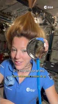 A floating bubble of water turns into a lens in microgravity💧
