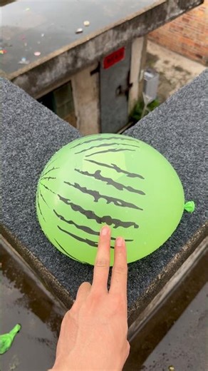 Experiment: Will a Water Balloon Explode If Rolled Down a High-Rise Building? 💥🎈 #balloon