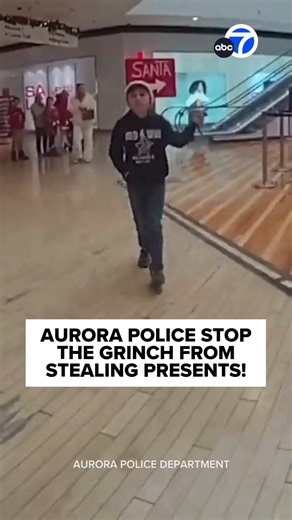 Aurora police caught the Grinch stealing presents right under Santa's nose, but police were able to swiftly place him under arrest! 🎄🎁 | ABC7
