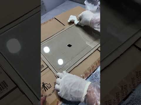 Specialized two-component colored glass coating process for scratch and peel resistance.