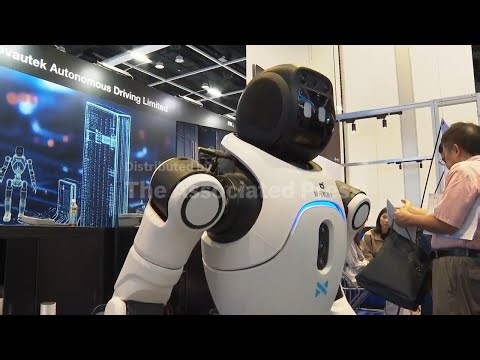 Humanoid robots show off their language and boxing skills