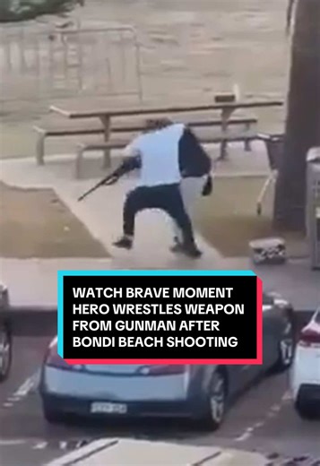 Watch the incredible moment a brave bystander wrestled a gun off an alleged shooter during the Bondi Beach atrocity. Twelve people are dead after two gunmen opened fire at the Sydney beach on Sunday night, the first night of Hanukkah. #Australia #BondiBeach #Hanukkah #GBNews