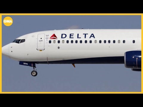 Delta cutting complimentary snacks and drinks