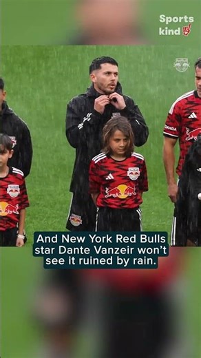 MLS stars of New York Red Bulls share rain jackets with child mascots