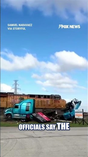 WATCH: Trucker NARROWLY escapes freight train CRASH #shorts #us #viral #crash