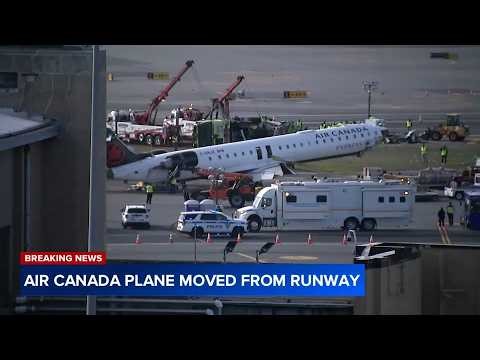 Air Canada plane moved from runway as NTSB investigation continues into LaGuardia Airport crash