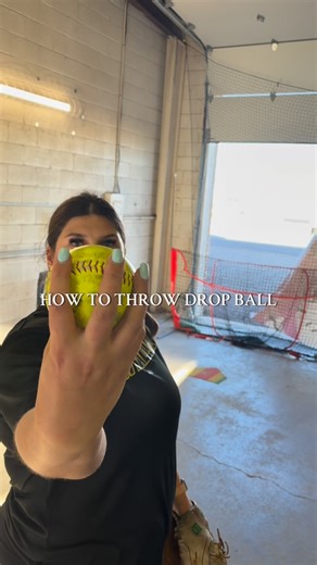 Pitching Coach Emily on Instagram: "How to throw drop ball 🥎 the key word is “bounce it”. Stay on top of the ball and bounce it in front of you. #softball #dropball #drop #fastpitch"