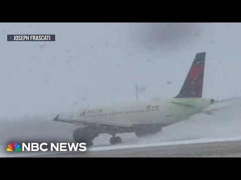 Snowstorm scrubs thousands of flights during busy travel weekend