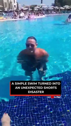 The man's dissolving swim shorts leave him trapped in the pool