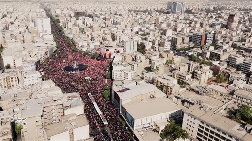 🚨🇮🇷 CHECK OUT this aerial view of Enghelab Square and the full 5km stretch to Azadi Square in Tehran, completely packed with mourners in black & red for Khamenei's funeral procession. The vehicle carrying the martyrs is reportedly stuck in the density. Organizers are calling this the biggest funeral in Iran's history. That’s an insane amount of people. It shows that support for the regime was wider than originally estimated. Writer: Jamie