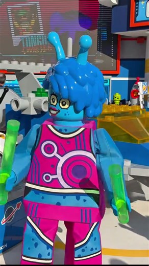An alien dancer at LEGOLAND Florida prancing and dancing!