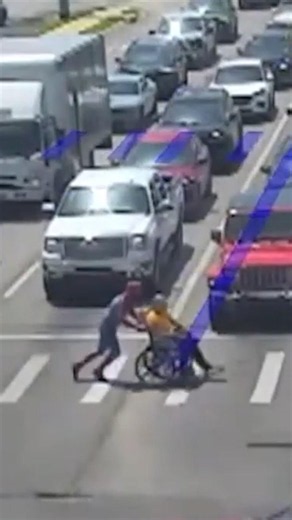 Real-life Spider-Man helps man in wheelchair cross busy Arkansas intersection