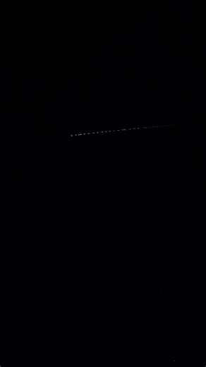 Starlink Satellite Train Moves Across Night Sky Over Tenerife