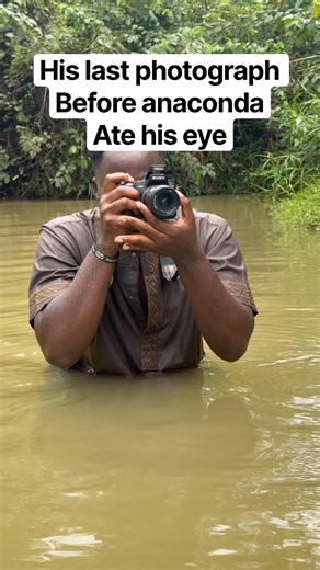 Anaconda and photographer