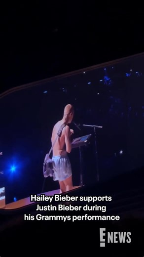 Hailey Bieber said, go baby go. 🤏🤏 The #Grammys crowd cheers every time the camera cut to Hailey Bieber during Justin Bieber's #Grammys performance. | E! News