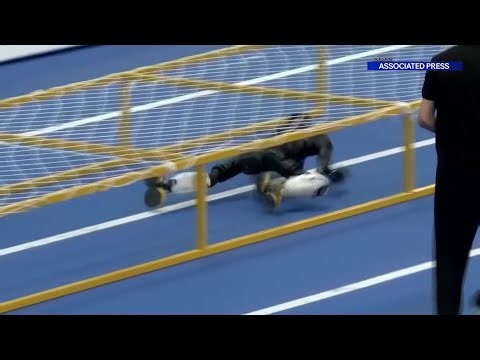 VIDEO NOW: Must See - Humanoid robots display agility at Beijing robot games