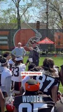 Coach Monken and Carson break down the huddle after day 1