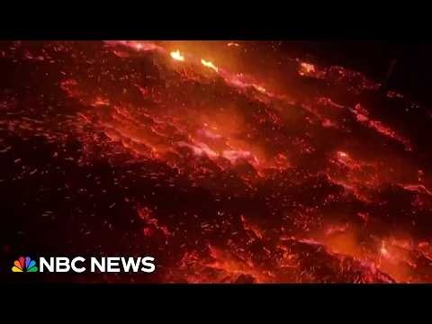 Wildfire burns homes and forces evacuations