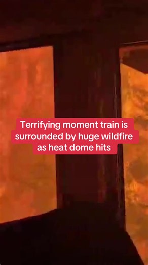 This is the terrifying moment a train is engulfed by a raging wildfire as a record-breaking heat dome plagues North America. Footage recorded by crew onboard the locomotive shows a wall of flames as the train passes through what would normally be a forest in Northern Ontario, Canada. Click above to read the full story. #worldnews #tragedy #wildfires #environment #climate