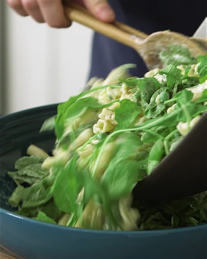 This creamy pasta salad has a tangy buttermilk dressing, and lots of bright green spring vegetables like arugula and asparagus. GET THE RECIPE: bit.ly/4aq3xPP | Food & Wine
