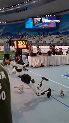WATCH: Robot crashes into judges' table during humanoid weightlifting final #shorts #foxnews #news