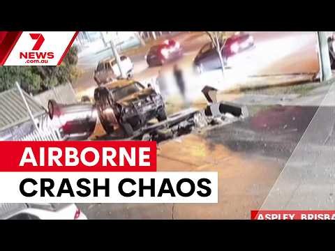 Airborne car damages Brisbane home in high-speed crash | 7NEWS