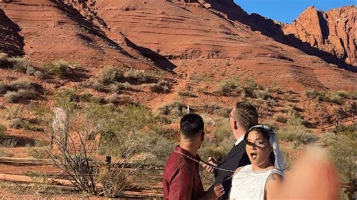 Incredible moment rockslide interrupts wedding